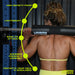 A woman with a muscular back lifts a barbell cushioned by the black Urban Fitness Barbell Squat Pad, which features high-density foam, lightweight design, easy attachment, superior comfort, and excellent neck and shoulder squat support.
