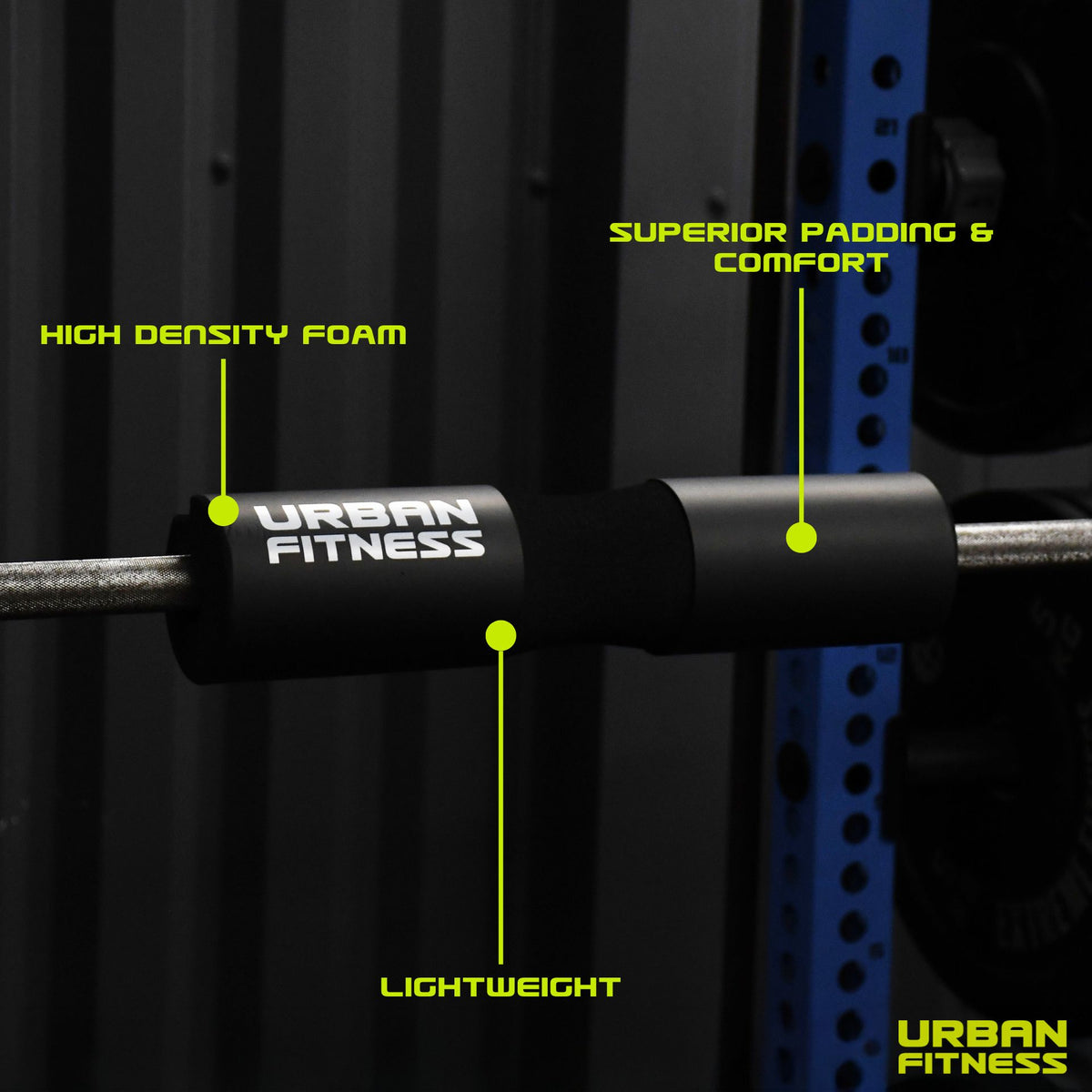 The Urban Fitness Barbell Squat Pad in black features high-density foam, superior padding for comfort, and a lightweight design. The Urban Fitness logo is visible on the pad and backdrop, highlighting ultimate squat support.