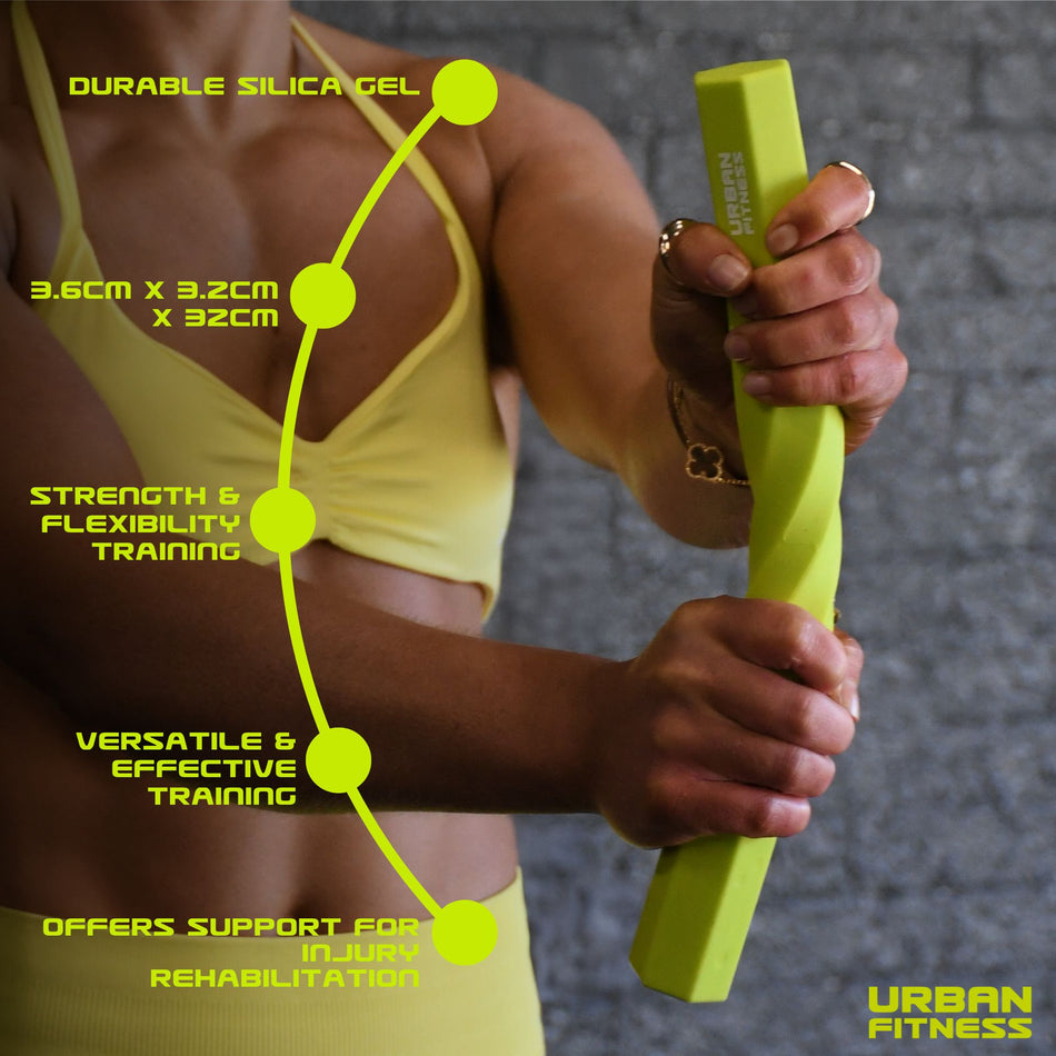 A woman in yellow workout wear holds the Urban Fitness Twist & Flex Resistance Bar in yellow, highlighting its durable silica gel, grip strength benefits, 15" length, versatility for flexibility training, and injury recovery support.