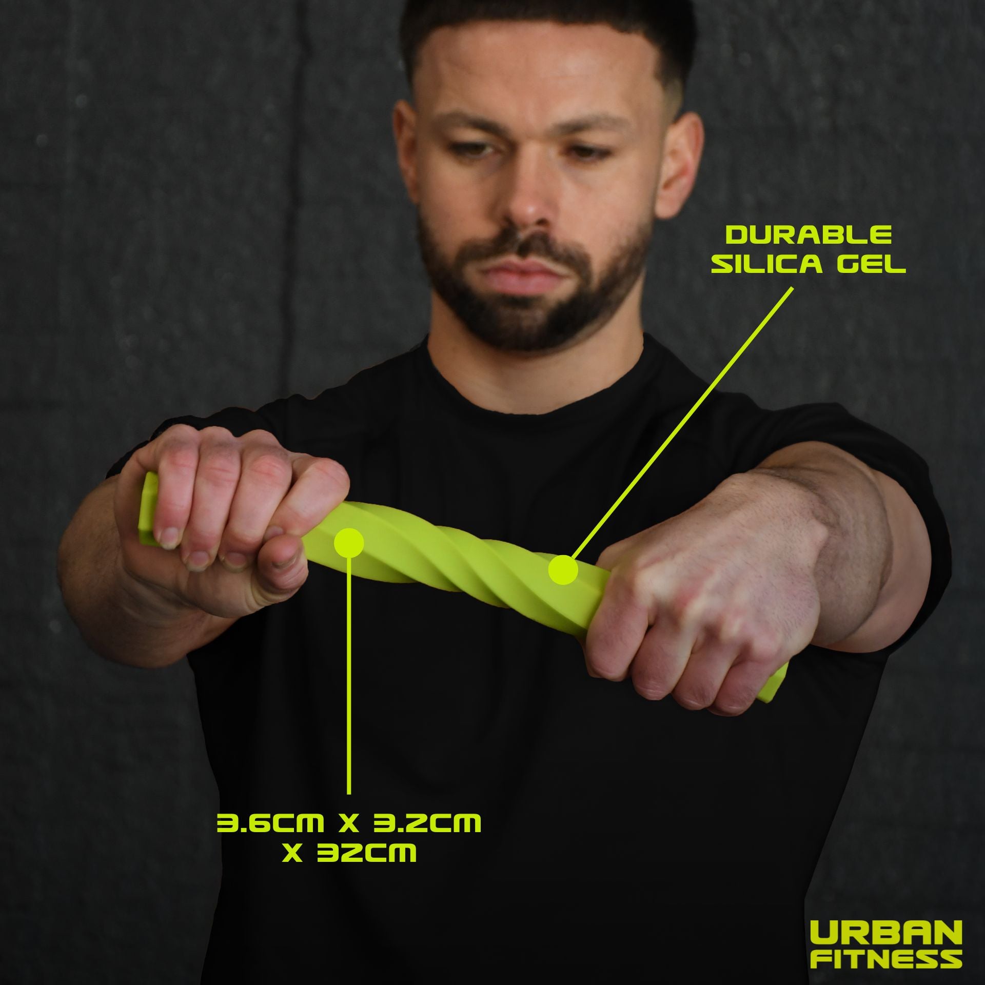 A man in a black shirt stretches the Urban Fitness Twist & Flex Resistance Bar, made of durable silica gel, sized 3.6cm x 3.2cm x 32cm—ideal for grip strength and injury recovery. Urban Fitness logo visible bottom right.