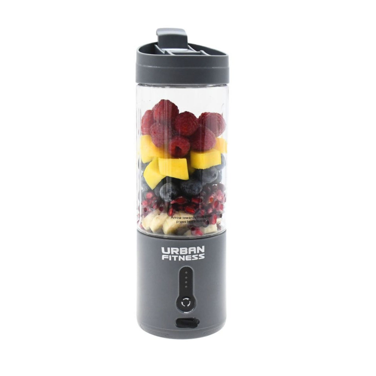 The Urban Fitness VitalFuse Portable Blender by Urban Fitness, packed with raspberries, mango chunks, blueberries, pomegranate seeds, and banana slices, delivers on-the-go nutrition against a clean white background.