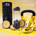 A black foam roller, yellow kettlebell, resistance band, half a pineapple, banana, fitness cards, and the Urban Fitness VitalFuse Portable Blender with fruit inside are arranged on yellow—ideal for on-the-go nutrition. Text: Urban Fitness.