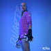 A goalkeeper in a pink kit and Precision Elite 3.0 Quartz Goalkeeper Gloves by Precision Training poses confidently against a blue background, with "Quartz" beside her and the Precision Training logo in the bottom right corner.