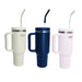 Three tall Urban Fitness VitalSip V2 Bottles with handles, each featuring a lid and bent straw in white, dark blue, and light pink, are arranged side by side on a white background.