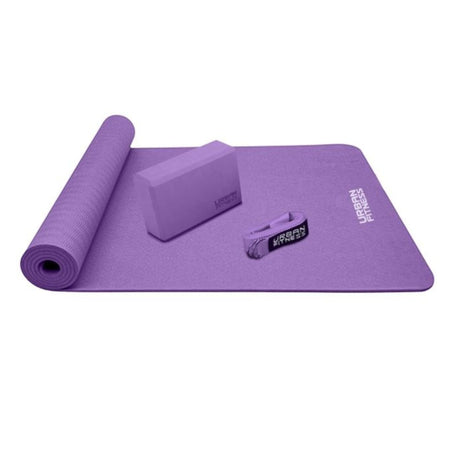 The Urban Fitness Yoga Kit includes a rolled-out purple mat with matching block and strap, all branded by Urban Fitness—ideal for your home yoga practice.