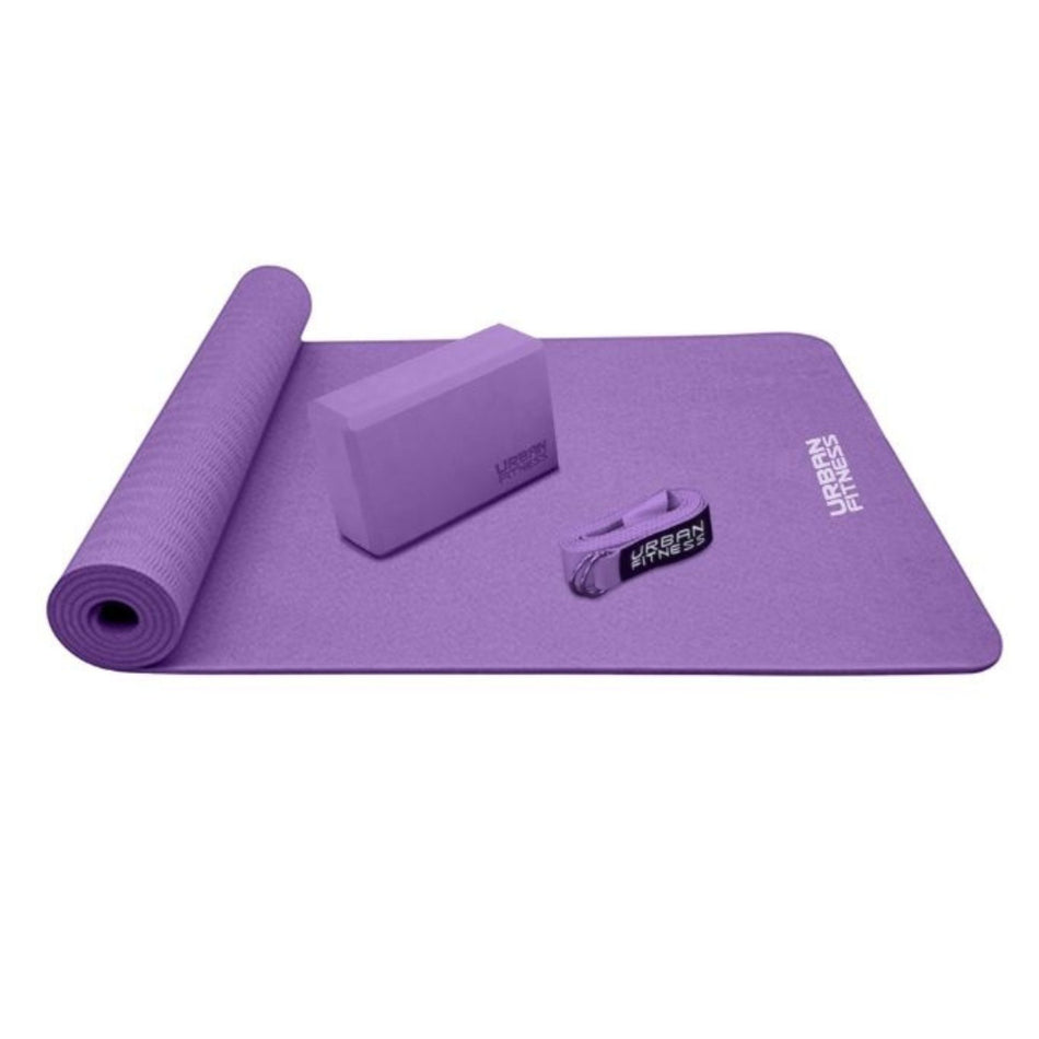 The Urban Fitness Yoga Kit includes a rolled-out purple mat with matching block and strap, all branded by Urban Fitness—ideal for your home yoga practice.