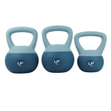 Three Urban Fitness Dual Soft Kettlebells in blue, labeled 8kg, 6kg, and 4kg from left to right, are shown side by side. Each features a wide handle—ideal for functional training and home workouts. Brand: Urban Fitness.