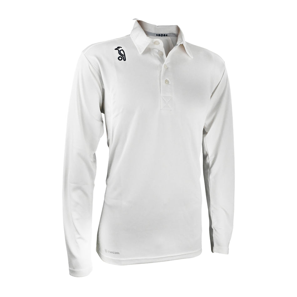 The Kookaburra Pro Player Long Sleeve Shirt by Kookaburra is a white collared cricket shirt with neck buttons, a small black shoulder logo, and moisture-wicking fabric, shown on a plain white background.