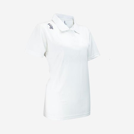 The Kookaburra Ladies Pro Player Cricket Shirt is a white, short-sleeve polo with a collar, buttons, and a subtle dark logo on the right shoulder. Made from stretch fabric and featuring Stay Cool Technology for lasting comfort.