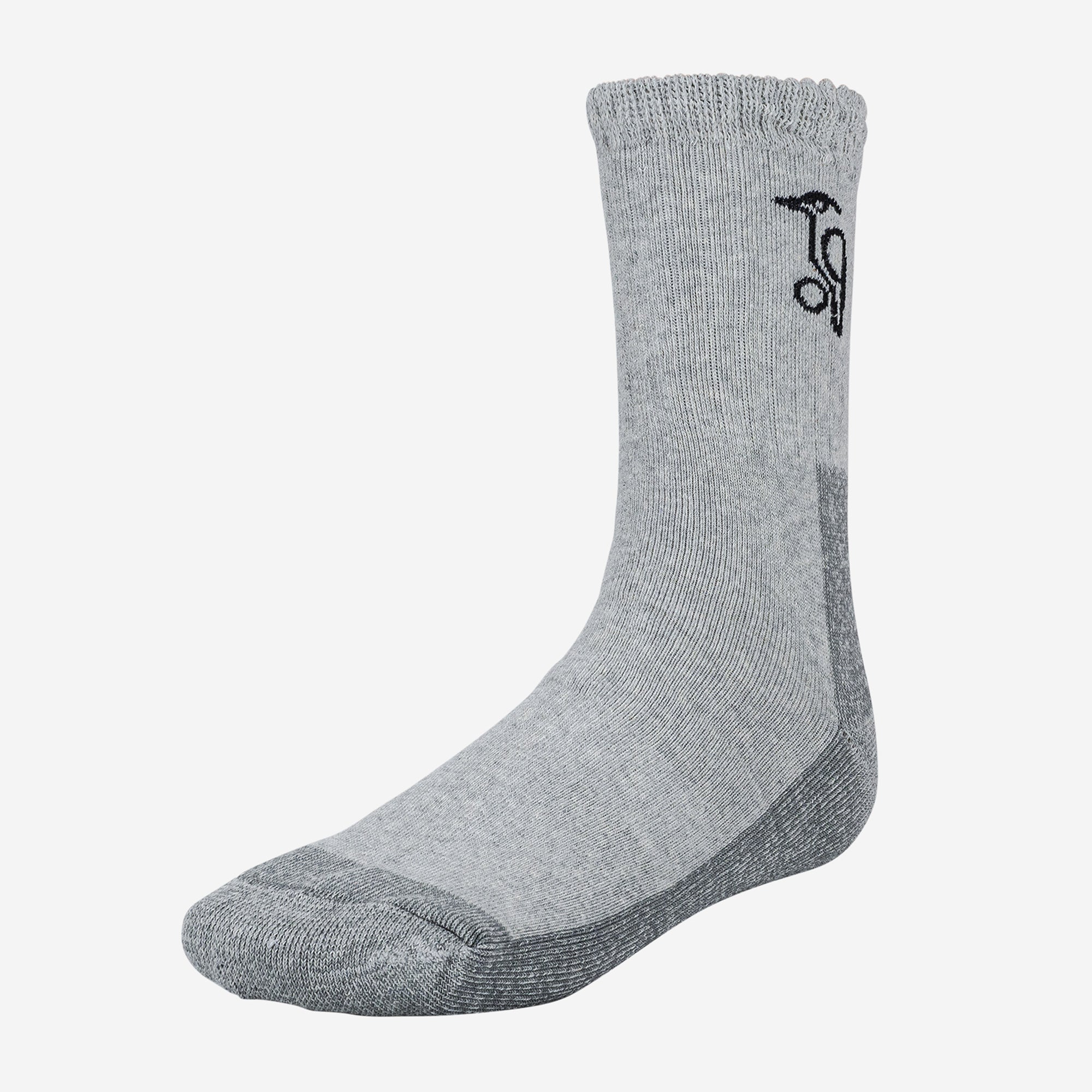 The Kookaburra Cricket Sock by Kookaburra is shown in grey with darker accents on the toe and heel, a black logo near the cuff, and a cushioned sole, displayed on a white background.
