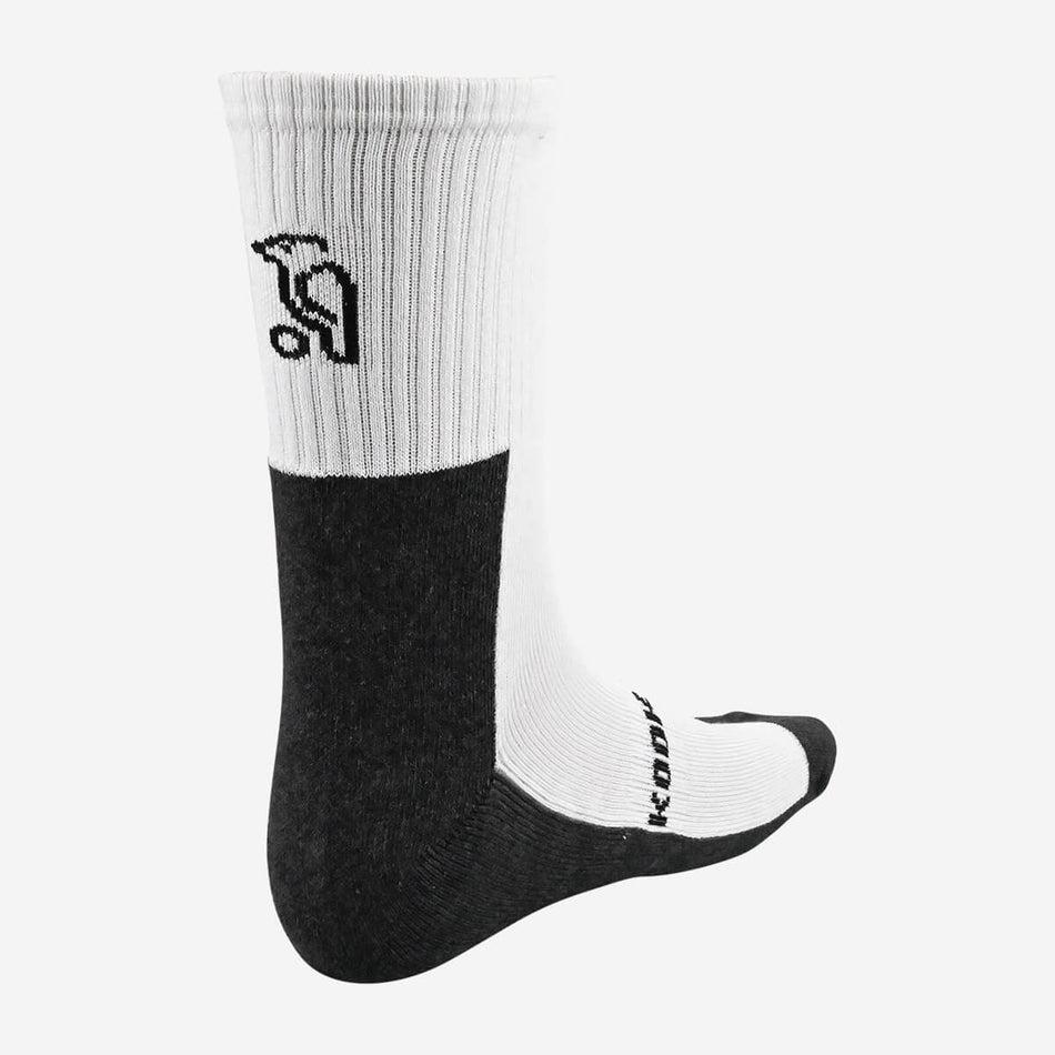 The Kookaburra Air Flex Cricket Socks (Two Pack) by Kookaburra feature moisture management to keep feet dry and comfortable all day, with ribbed uppers, black toe and heel, and a stylized golfer logo near the top.