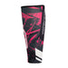 The Kookaburra Hockey Shin Sleeves - No Stirrups feature black, pink, and white abstract patterns with "KOOKABURRA" printed vertically—offering comfortable shin protection for hockey or other sports.