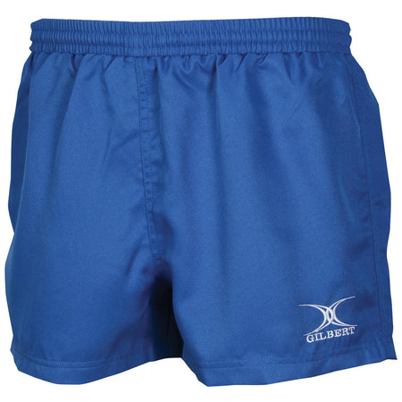 The Gilbert Saracen V3 Short – Junior in royal is a lightweight pair of kids’ rugby shorts featuring an elastic waistband and a small white Gilbert logo on the left leg. Ideal for junior rugby players, these shorts are shown against a plain white background.
