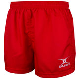 The Gilbert Saracen V3 Short – Junior in red features a bright, lightweight design with an elastic waistband. The word “GILBERT” and a white logo are embroidered on the front of the left leg. These junior shorts have a simple, plain style, making them an excellent choice for kids’ rugby gear.