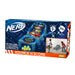 The Nerf Bounce N Score game box shows kids playing with foam balls, a bouncing pad, and a target with colored point zones. Features indoor/outdoor play and family icons. From Nerf, for ages 6+.