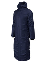 The Kings School Touchline Jacket by Martin Berrill Sports is a navy padded winter coat with a hood, snap buttons, zippered side pocket, black cuffs, and embroidered school logo, shown on a plain white background.