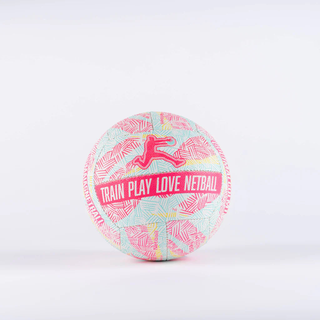A vibrant Gilbert Ambassador Signature Netball (size 5) by Gilbert, featuring pink and yellow patterns and "TRAIN PLAY LOVE NETBALL" text, displayed on a plain white background.