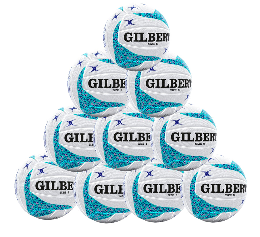 A stack of ten blue Gilbert APT Netballs, arranged in four layers with visible Gilbert logos, ideal for school netball sessions and supplied as a Ten Ball Pack.