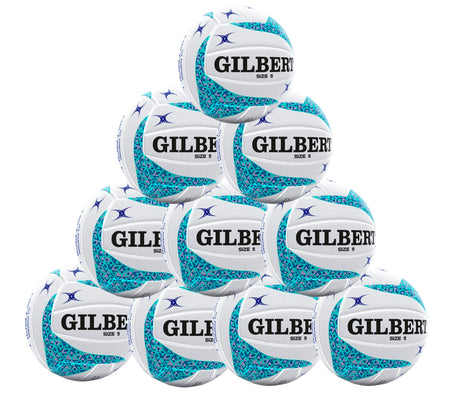 A stack of ten blue Gilbert APT Netballs, arranged in four layers with visible Gilbert logos, ideal for school netball sessions and supplied as a Ten Ball Pack.