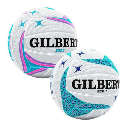 Two white Gilbert APT Netballs, size 5, showcase teal, purple, and blue geometric designs with the bold Gilbert logo—ideal training balls for outdoor netball sessions.