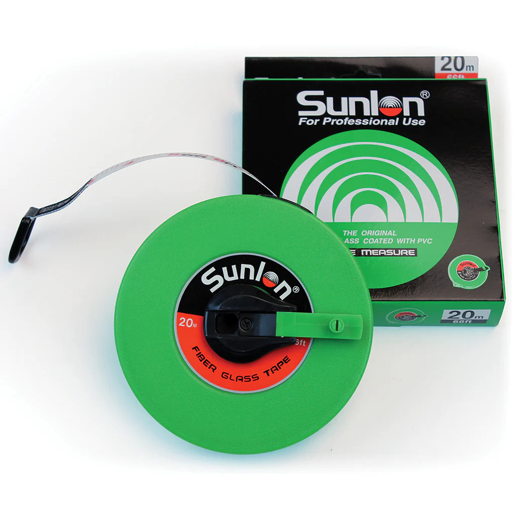 A Martin Berrill Sports Measuring Tape (Closed Case) in green fibreglass with a black handle is partially extended. This durable tool comes in black and green packaging, measures 20 meters, and is intended for professional use.
