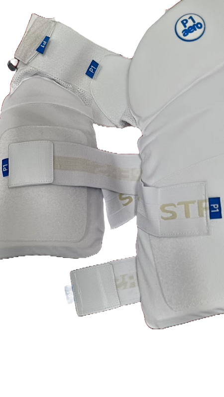 Close-up of Aero P1 Strippers V8 by Aero—white padded cricket lower body protection with EVA foam for extra hip safety, adjustable straps, and blue P1/P1 aero labels, shown on a light background.
