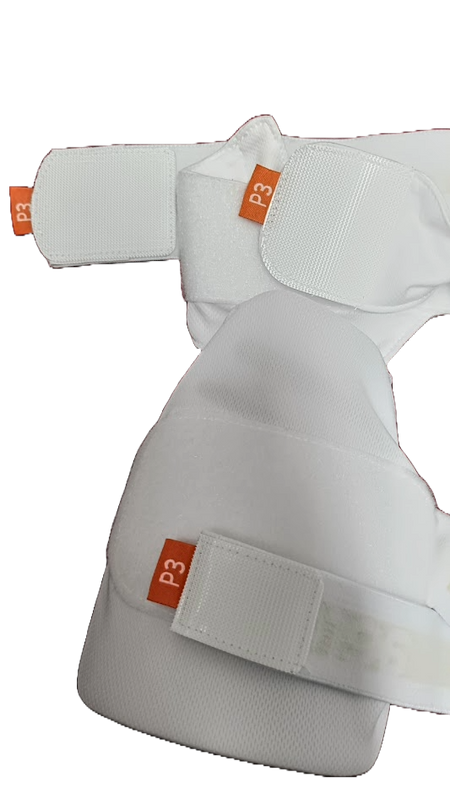 Close-up of Aero P3 Strippers V8, white padded lower body sports guards with orange P3 tags. Designed for cricket by Aero, these guards feature Velcro straps for adjustable fit and offer ultimate protection.