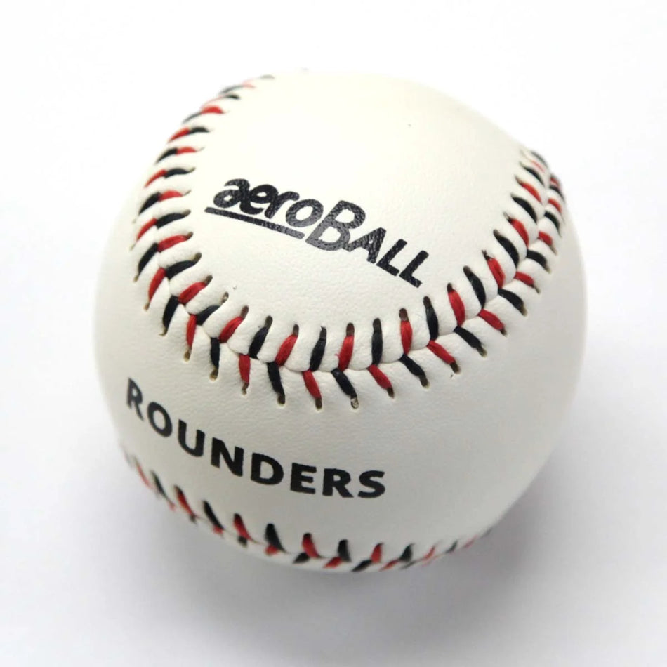 The Aero Safety Rounders Ball by Aero is displayed against a plain white background. This white rounders ball features red and black stitching, with “aeroBall” and “ROUNDERS” printed on its surface. It’s an excellent choice for schools or clubs seeking a reliable training cricket ball or an Incrediball alternative.