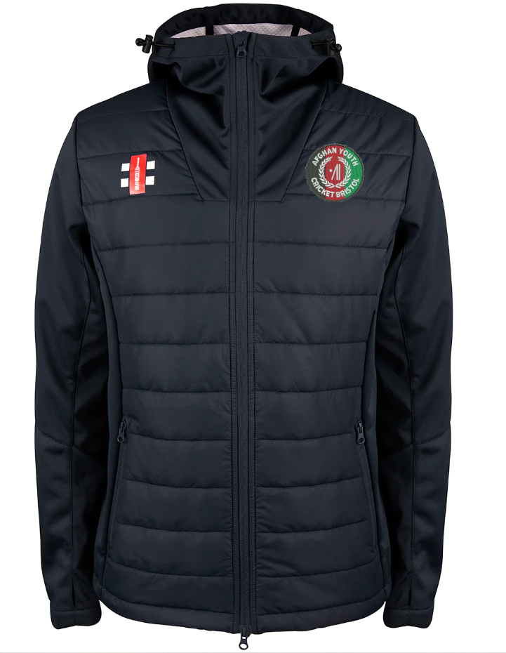 The Gray Nicolls Afghan Youth Cricket Bristol CC Pro Performance Jacket is a black, hooded zip-up with front horizontal quilting, featuring a red and white cricket bat logo on the right chest and a green round logo with text and red detail on the left.