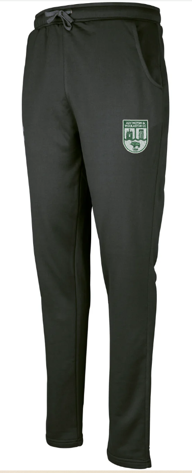 The Gray Nicolls Alvington & Woolaston CC Pro Performance Training Trousers feature side pockets, a drawstring waist, and a green and white crest logo—ideal for intense workouts.