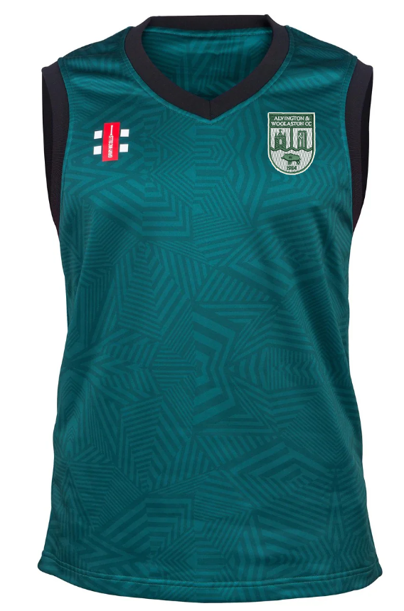 The Gray Nicolls Alvington & Woolaston CC Pro T20 Slipover is a sleeveless teal jersey with a geometric pattern, black collar, red patch with white text on the right chest, and green/white crest on the left. Made from recycled polyester.