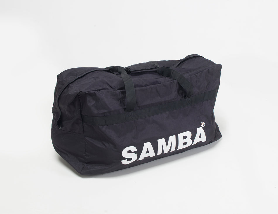 The Samba Sports Samba Team Kit Bag is a large black equipment bag with two handles, bold white "SAMBA" lettering on the side, and high-capacity storage, shown against a plain white background.