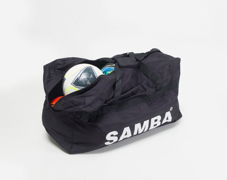 The Samba Sports Samba Team Kit Bag, shown partially open with a soccer ball and gear inside, highlights its spacious storage capacity and features bold white SAMBA branding on a sleek black design.