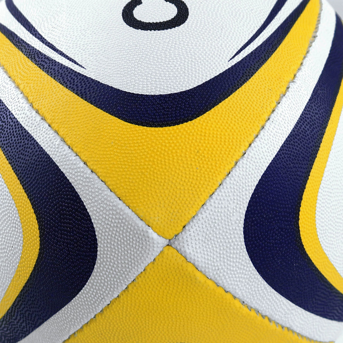 Close-up of a Centurion Nero Trainer Rugby Ball - Ten Pack by Centurion, featuring white, yellow, and dark blue geometric panels—a durable set ideal for training sessions.