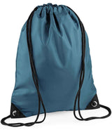 The PenCarrie BagBase Premium Gymsac in Airforce Blue features black drawstrings, reinforced black corners with metal grommets, and water-resistant fabric—a stylish choice set against a white background.