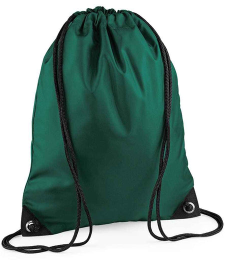 The PenCarrie BagBase Premium Gymsac in Bottle Green features black drawstrings and reinforced black corners, standing upright against a white background.