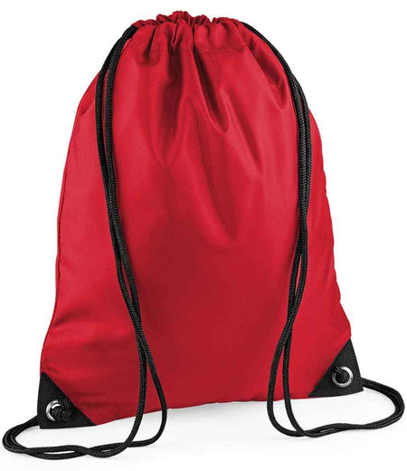 The BagBase Premium Gymsac by PenCarrie in Classic Red features black drawcords and metal grommets at the corners, shown against a white background.