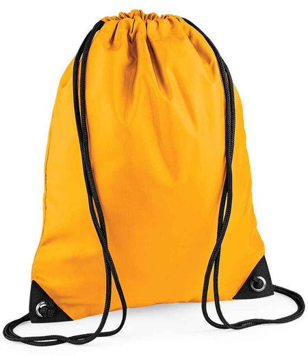 The PenCarrie BagBase Premium Gymsac in gold features black drawstrings and reinforced black corners, displayed against a white background.