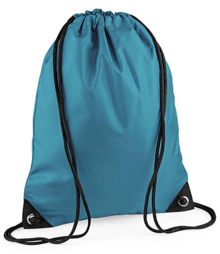 The PenCarrie BagBase Premium Gymsac in Ocean Blue is a water-resistant drawstring bag with sturdy black cords and reinforced corners with metal grommets, displayed upright against a white background.