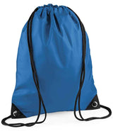 The PenCarrie BagBase Premium Gymsac in sapphire blue features black cords, reinforced corners with silver metal eyelets, and water resistance, displayed against a white background.