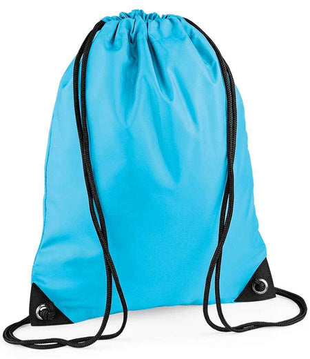 The PenCarrie BagBase Premium Gymsac in Surf Blue is a water-resistant drawstring bag with black strings, reinforced black corners, and metal grommets.