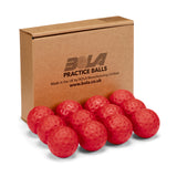A cardboard box labeled "Bola Bowling Machine Balls - 12 Pack" from the Bola brand sits behind 12 red practice balls, each dimpled and arranged in two rows on a white background.