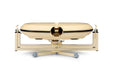 Beige, oval-shaped Bola Fielding Training Machine by Bola—vintage medical device aesthetic with a central opening, echoing the precise engineering found in Gimballed Turntable systems—mounted on a metal stand with four gray feet and photographed against a white background.