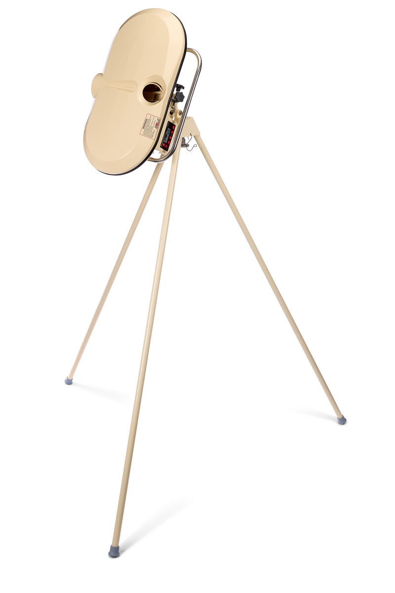 Beige retro-style standing fan on a tall, three-legged tripod with a rounded, flat front and side control switches, inspired by the classic design of the Bola Professional Bowling Machine by Bola, commonly used for cricket batting practice.