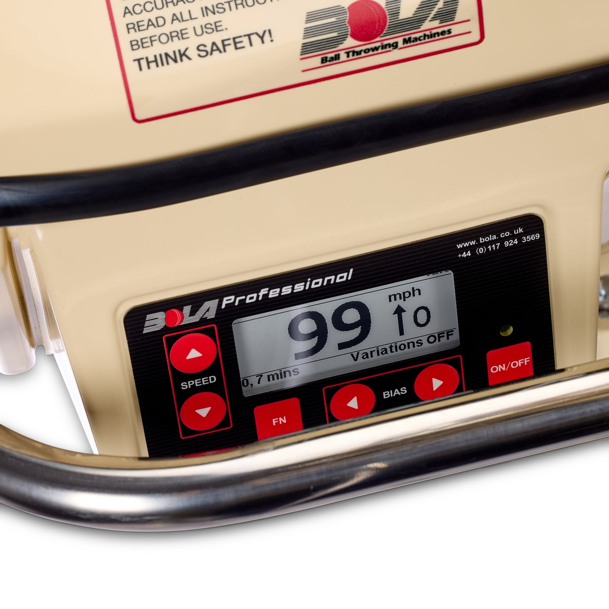 Close-up of the Bola Professional Bowling Machine’s control panel, branded by Bola, featuring an ePaper display indicating a bowling speed of 99 mph. The panel includes buttons for speed, function, and power adjustments, as well as a prominent warning label above—ideal for precise cricket batting practice.