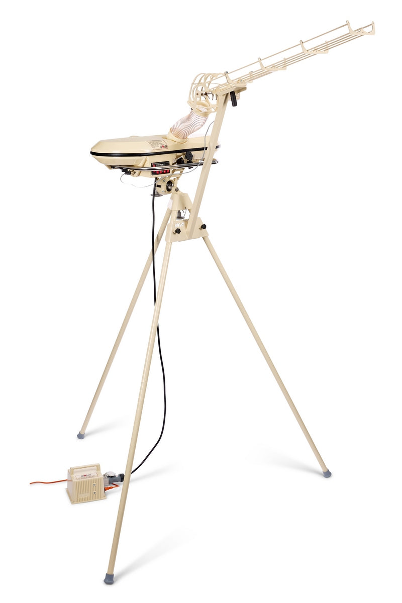 A cream-colored Bola Automatic 28 Ball Feeder Unit by Bola, featuring tripod legs, an electrical cord, a control box, and designed for solo batting practice with an electronic random delivery mode.