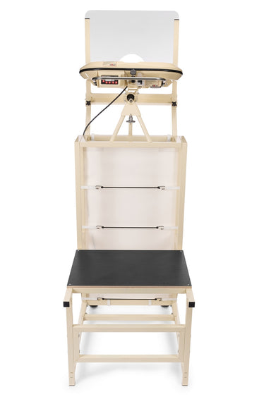 A beige ophthalmology device with an adjustable screen and chin rest, positioned above a black seat for eye examinations, features a sturdy design reminiscent of the Bola Bowling Machine Stand on Wheels by Bola, offering stability and ease of use during patient assessments.