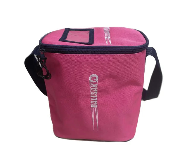 The Katchet BallSak by Katchet is a pink/navy insulated bag with a black shoulder strap, zipper closure, and "BRATSUN" printed vertically in white. It doubles as a ball bag for hockey or cricket balls and has a small transparent pocket on the lid.