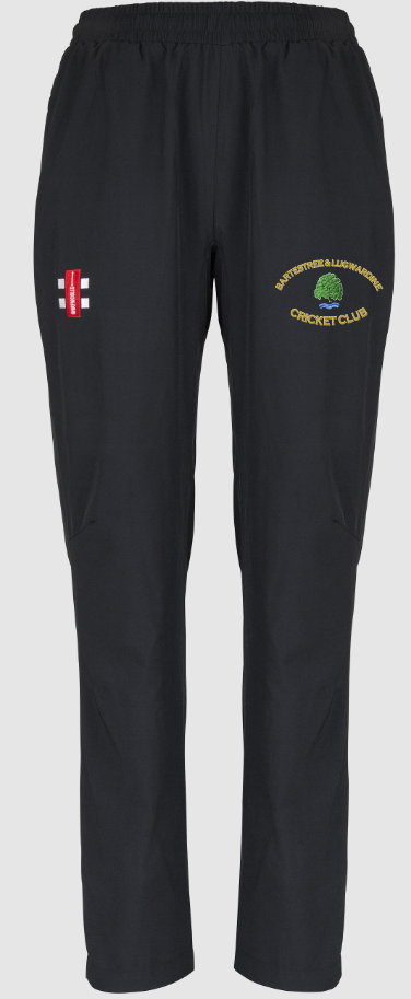 Gray Nicolls Bartestree & Lugwardine CC Ladies Velocity Track Trousers feature an elastic waistband, a red and white patch on the right thigh, and the club logo on the left. These lightweight pants are ideal for active days.