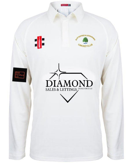 The Gray Nicolls Bartestree & Lugwardine CC Matrix V2 Long Sleeve Cricket Shirt is a white, moisture-wicking cricket shirt with sponsor logos and club crests on the front and sleeves.